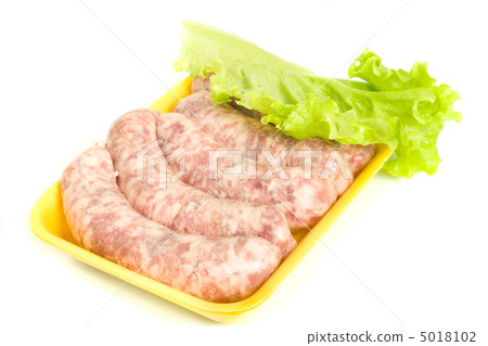 Uncooked Sausages and salad leaf 5018102