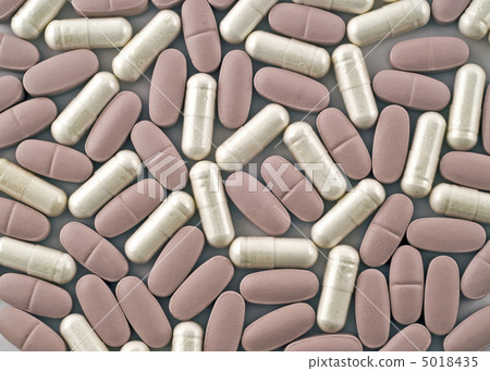 Closeup of tablets unf pills useful as background Closeup of tablets unf pills useful as background 5018435