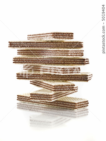 Stack of tasty waffles over white Stack of tasty waffles over white 5019404