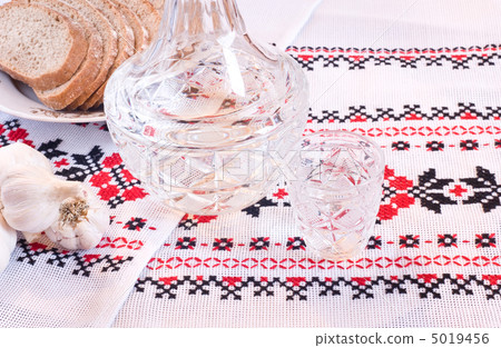 Vodka in decanter, bread and garlic Vodka in decanter, bread and garlic 5019456