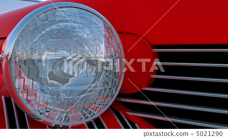Headlight of red retro car Headlight of red retro car 5021290