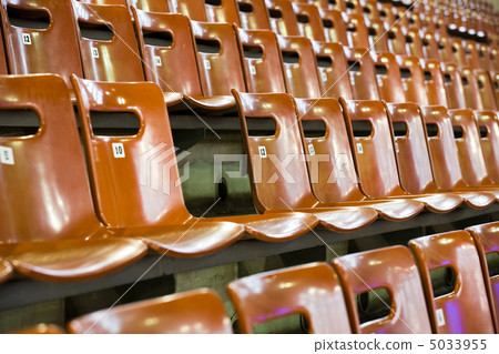 rows of seats with broken one 5033955