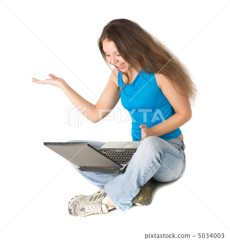 girl with laptop sits on floor 5034003