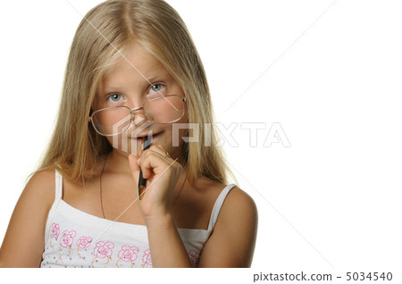 The thoughtful girl the blonde in glasses and with pen The thoughtful girl the blonde in glasses and with pen 5034540