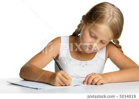 The girl writes to writing-books. The decision of lessons. 5034819