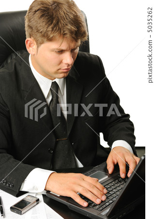 The young businessman on a workplace The young businessman on a workplace 5035262