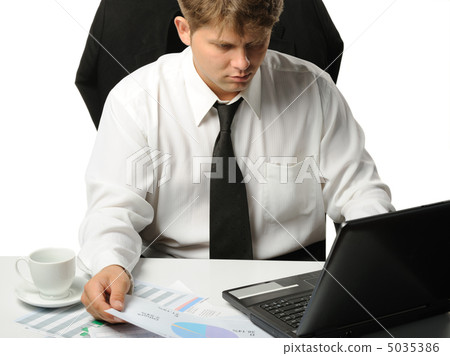 The young businessman on a workplace 5035386