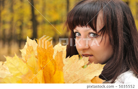 The girl in an autumn forest The girl in an autumn forest 5035552