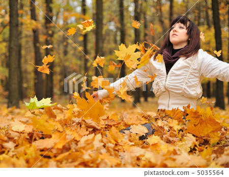The girl in an autumn forest 5035564