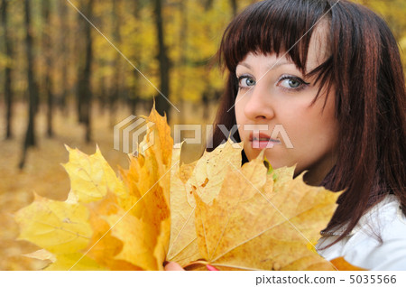 The girl in an autumn forest The girl in an autumn forest 5035566