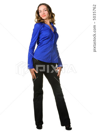 The attractive girl in trousers and dark blue shirt The attractive girl in trousers and dark blue shirt 5035762