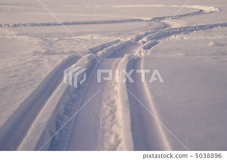 tracks on snow 5038896