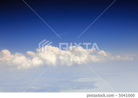 View above the earth at the clouds below. 5041000