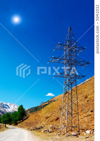 Power line high in the mountains. Power line high in the mountains. 5041032