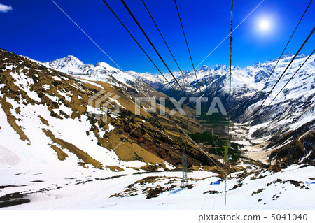 Wonderful view of the cableway in the mountains. Wonderful view of the cableway in the mountains. 5041040