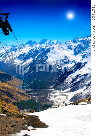 Wonderful view of the cableway in the mountains. Wonderful view of the cableway in the mountains. 5041049