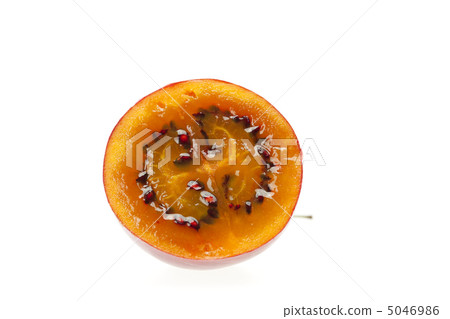 halve tamarillo isolated on white halve tamarillo isolated on white 5046986
