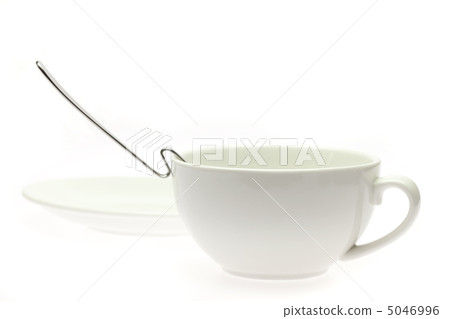 white cup, saucer and spoon isolated on white 5046996