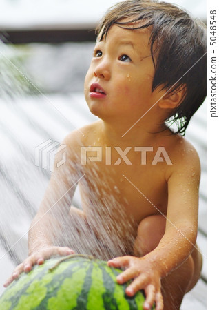 Children washing the watermelon Children washing the watermelon 5048548