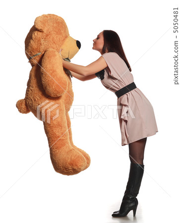 beautiful girl kissing toy bear 5050481