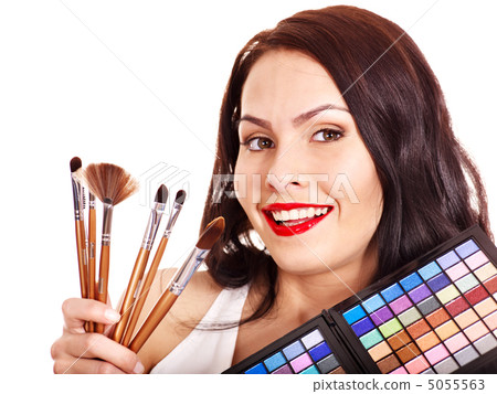Girl applying makeup. Girl applying makeup. 5055563