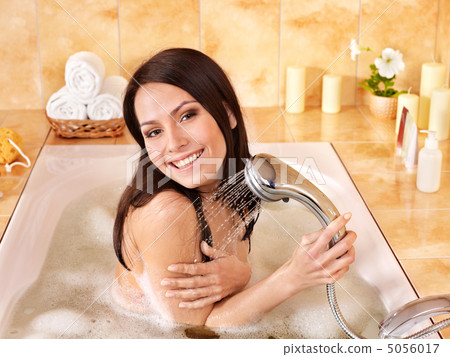Woman take bubble bath. Woman take bubble bath. 5056017