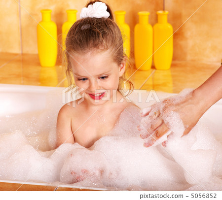Kid washing in bath. 5056852