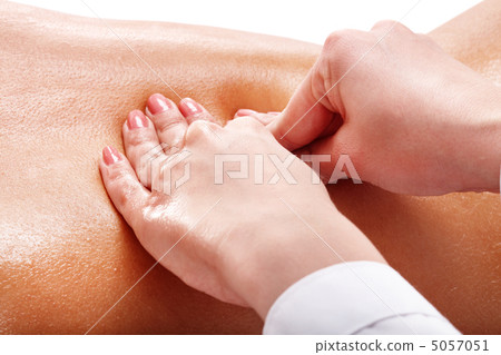 Massage of female back. 5057051