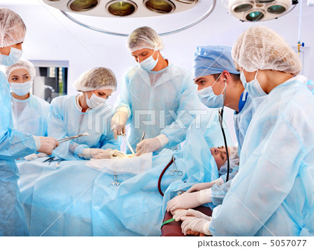 Surgeon at work in operating room. 5057077