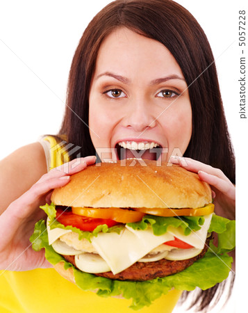 Woman holding hamburger. Woman holding hamburger. 5057228