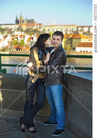 young couple on the Charles Bridge on the skyline young couple on the Charles Bridge on the skyline 5073355