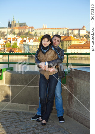 young couple on the Charles Bridge on the skyline 5073356
