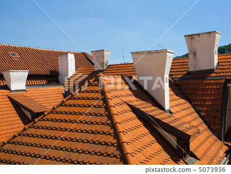 tiled roofs against the sky 5073936