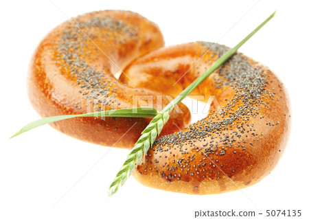 two roll with poppy and spike isolated on white two roll with poppy and spike isolated on white 5074135