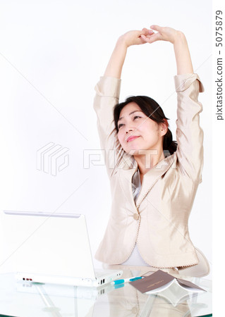 Stretching business woman 5075879