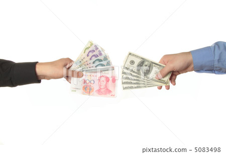 Hands holding yuan and dollar bills 5083498