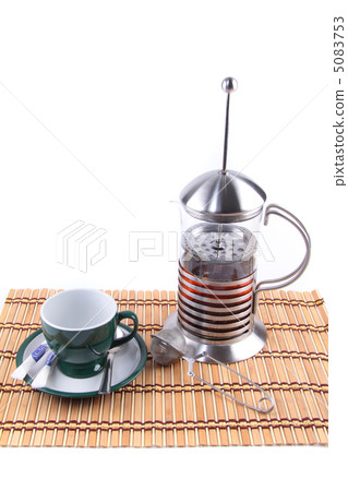 empty cup against Brewed tea empty cup against Brewed tea 5083753
