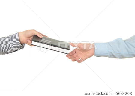 Hand holding a book 5084268