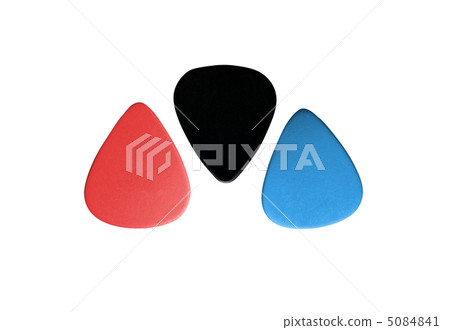 Closeup of 3 colourful plectrums isolated Closeup of 3 colourful plectrums isolated 5084841