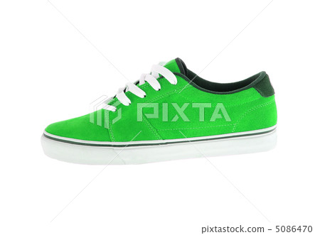 green sneaker with white strips isolated on white background green sneaker with white strips isolated on white background 5086470
