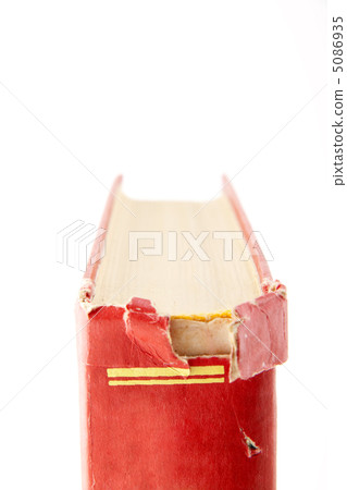 tattered book isolated on white background 5086935