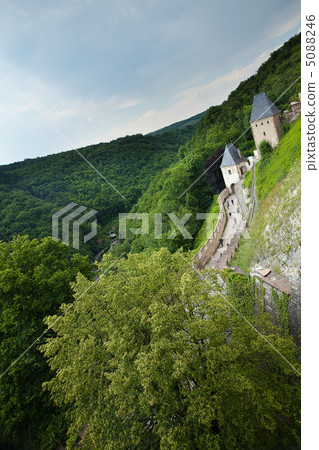towers of the fortress against the sky and hills 5088246