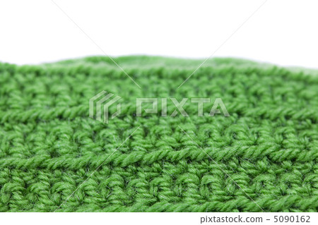 Skein of wool and knitted piece isolated on white Skein of wool and knitted piece isolated on white 5090162
