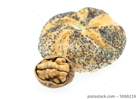 loaf with poppy seeds and walnuts isolated on white loaf with poppy seeds and walnuts isolated on white 5090219