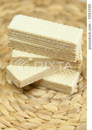 sweet wafers lying on a wicker mat sweet wafers lying on a wicker mat 5091099