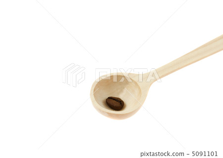 wooden spoon with coffee beans isolated on white wooden spoon with coffee beans isolated on white 5091101