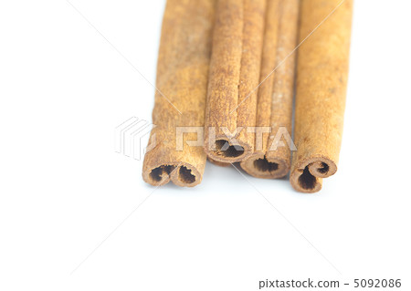 cinnamon sticks isolated on white cinnamon sticks isolated on white 5092086