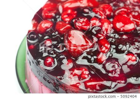 beautiful cake with berries on a plate isolated on white 5092404