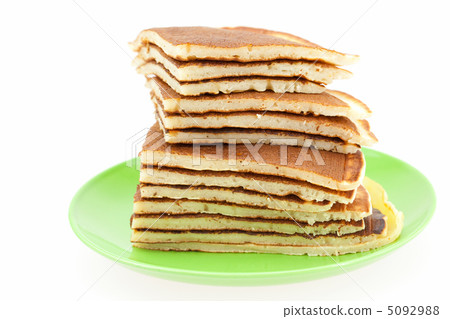 Pancakes on a plate isolated on white Pancakes on a plate isolated on white 5092988