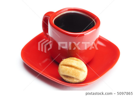 cup with coffee and cake nut isolated on white cup with coffee and cake nut isolated on white 5097865